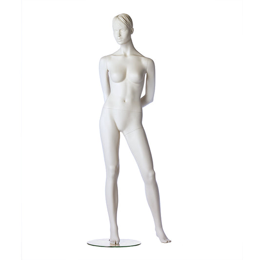 Stylised female mannequin from Hindsgaul in a standing pose with arms behind back.