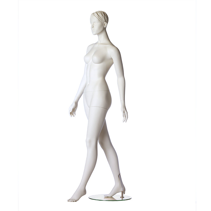 Stylised female mannequin from Hindsgaul in a walking pose.