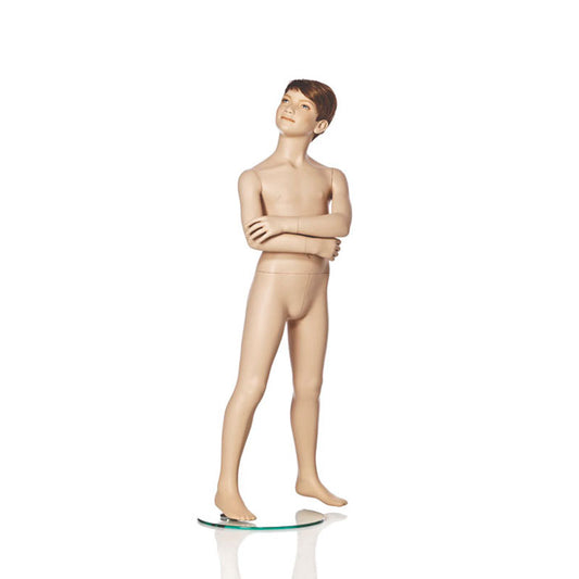 Realistic boy mannequin in standing pose.