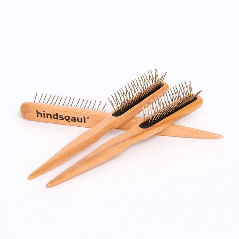 Three-row wig brush. This affordable must-have is specifically designed for styling and combing wigs.